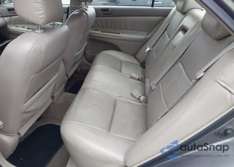 2003 Toyota Camry Le z USA, uszkodzony, nr VIN 4T1BE32K03U721258